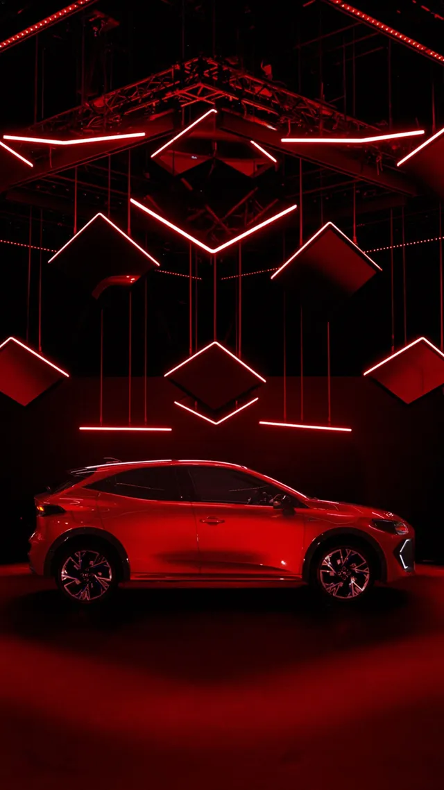 Nouvelle Renault Clio 6 rouge vue de profil sur un stand Renault